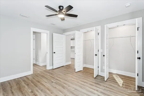 a view of a livingroom with wooden floor