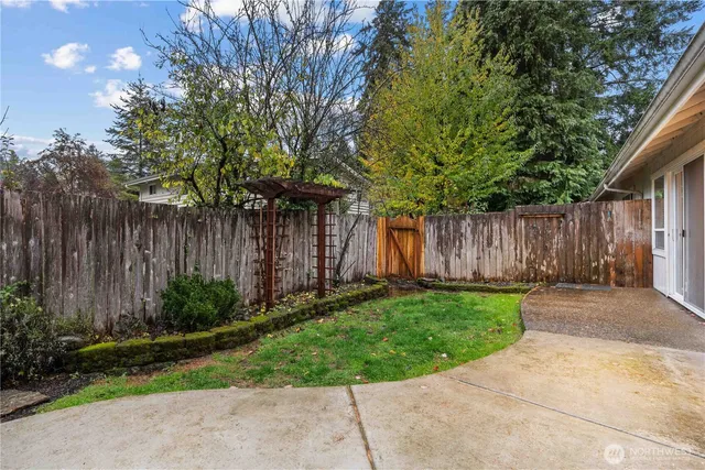 a view of a backyard with green space
