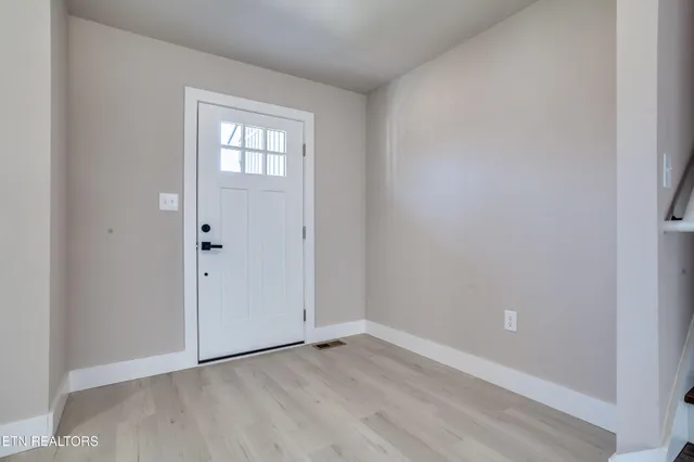 a view of an empty room with window