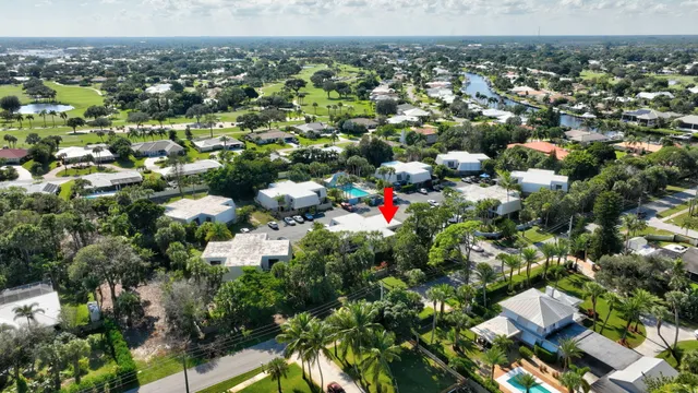 a view of a house with patio and garden