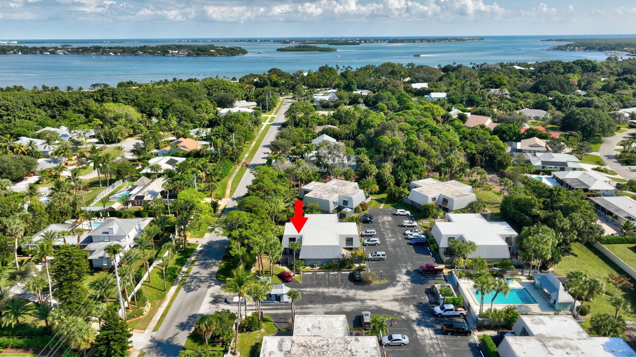 3860 Jefferson Street Stuart, FL 34997 - Photo 23 of 26 a view of lake and houses with outdoor space