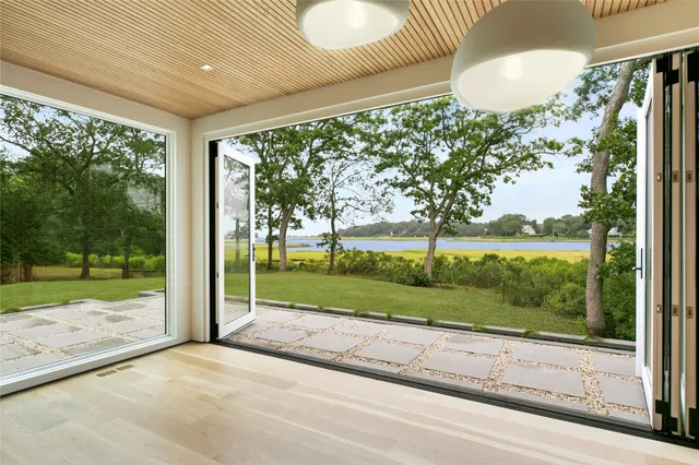 a view of a porch and garden