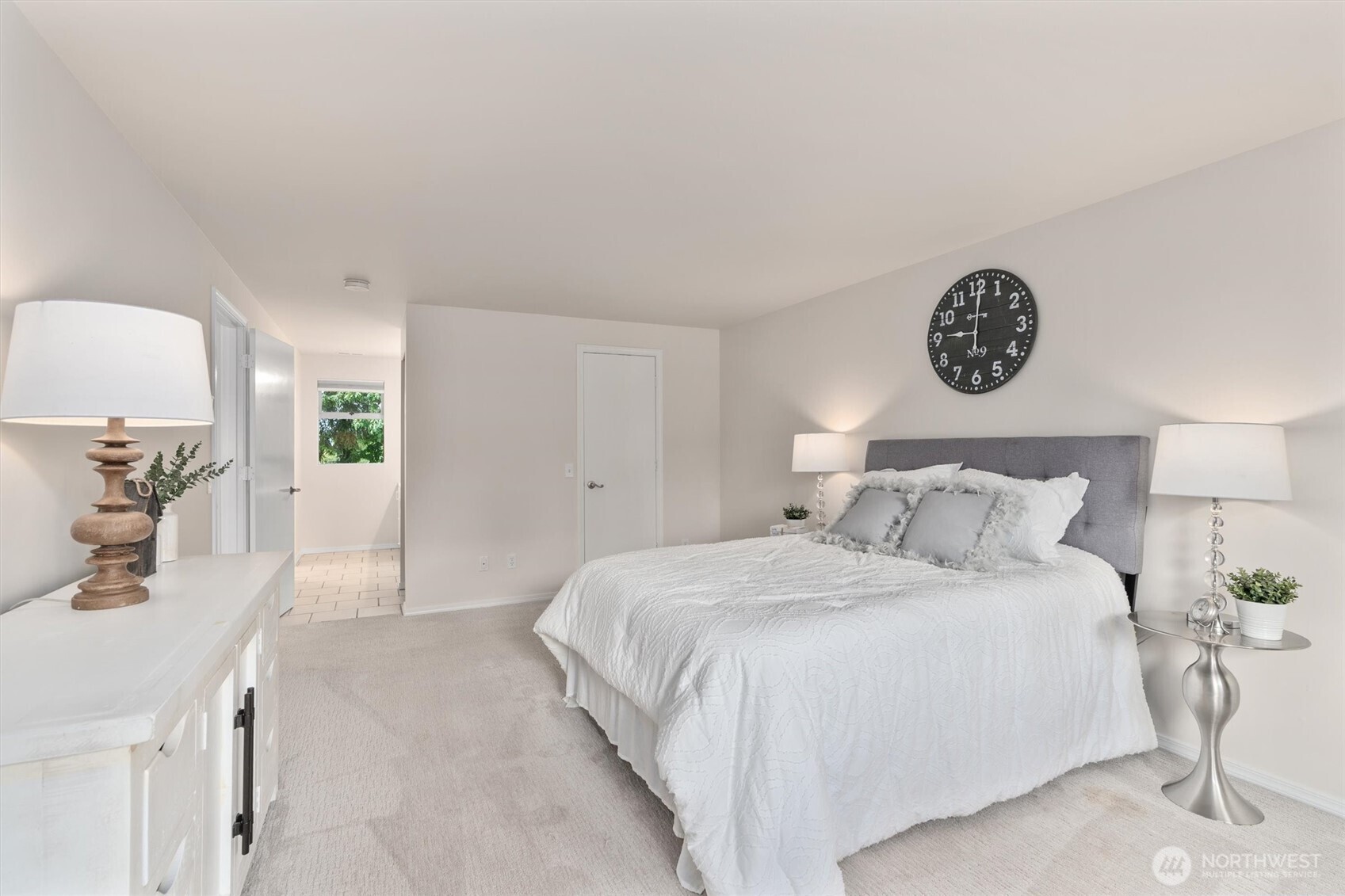 2101 233rd Street Southeast Bothell, WA 98021 - Photo 16 of 40 a bedroom with a bed and a table