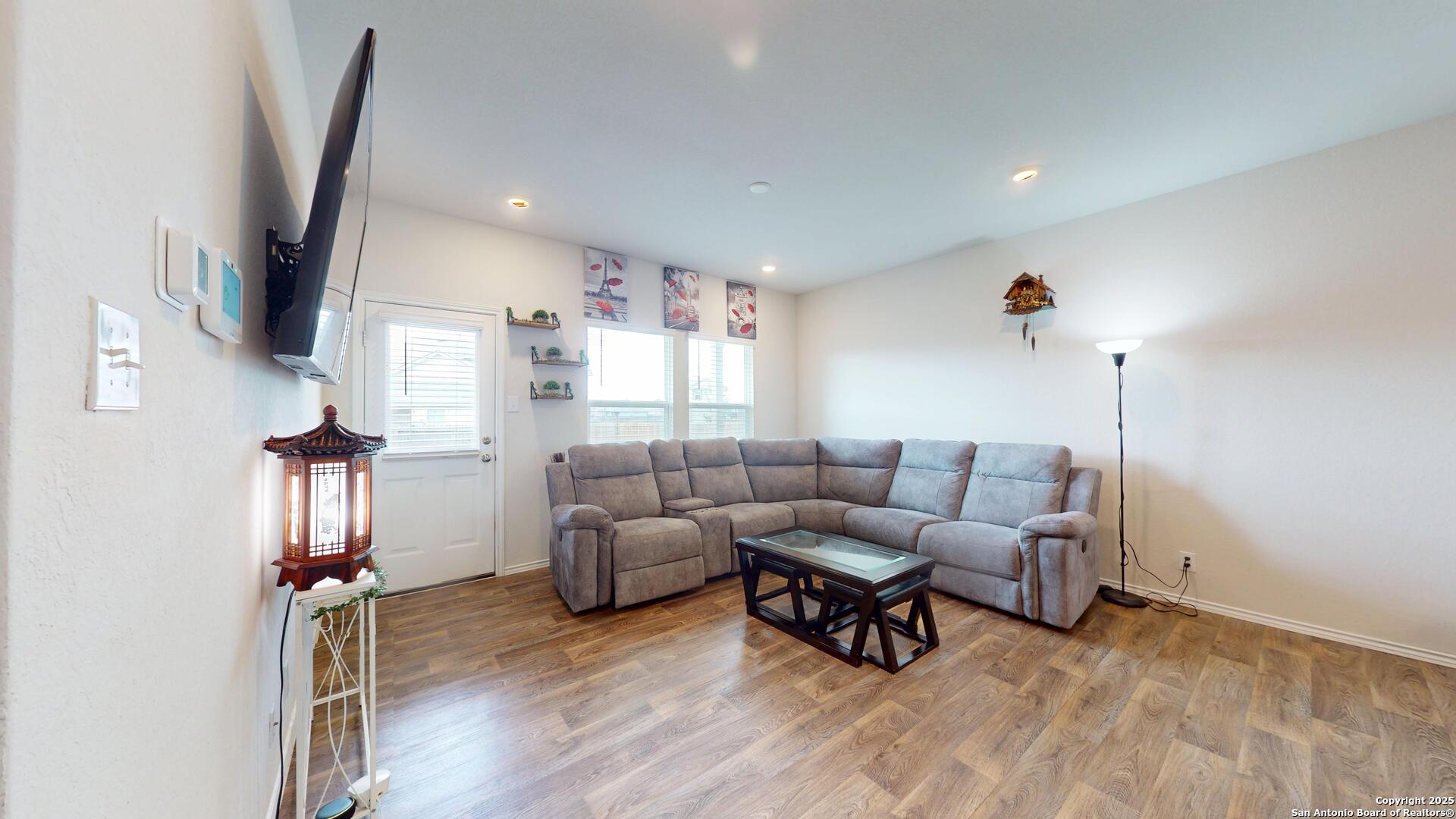 4021 Lilac Path St. Hedwig, TX 78152 - Photo 12 of 49 a living room with furniture and a flat screen tv