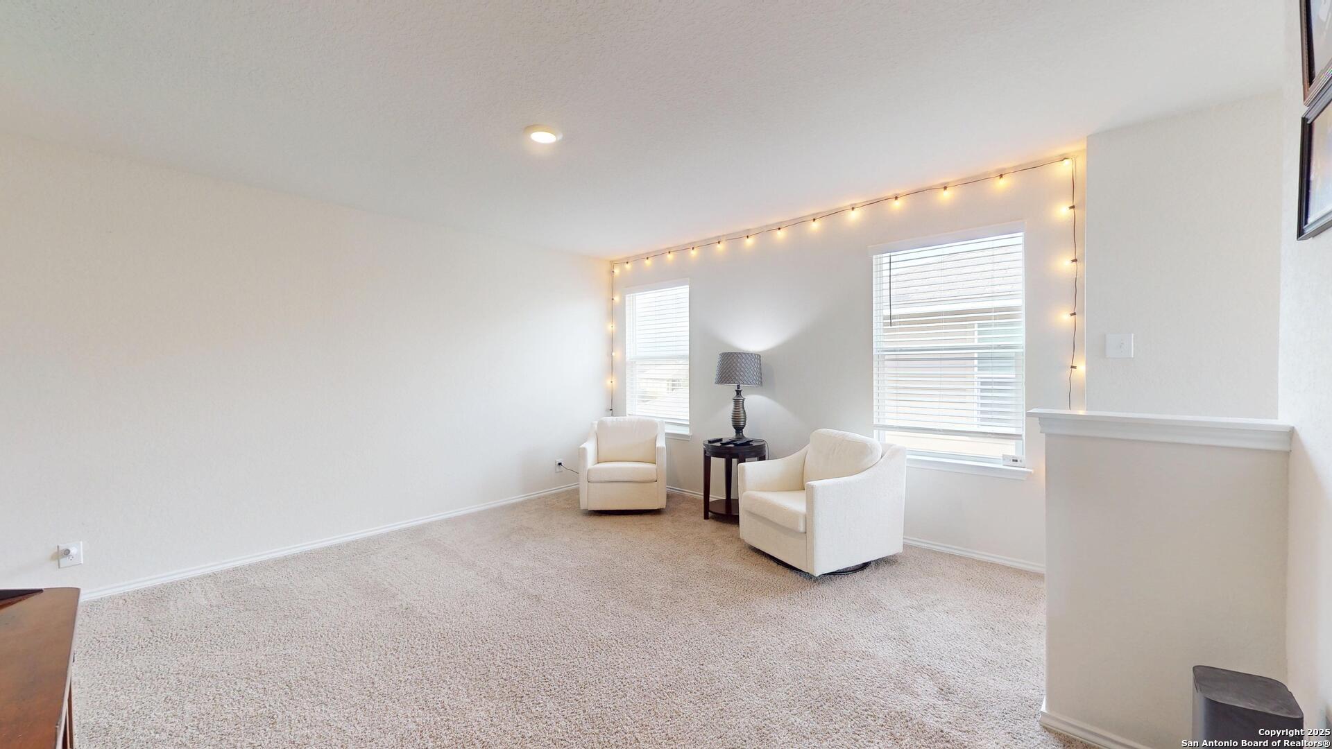 4021 Lilac Path St. Hedwig, TX 78152 - Photo 23 of 49 a living room with furniture and a window