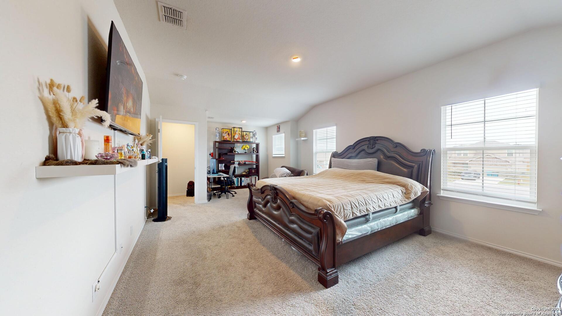 4021 Lilac Path St. Hedwig, TX 78152 - Photo 36 of 49 a bedroom with a bed closet and window