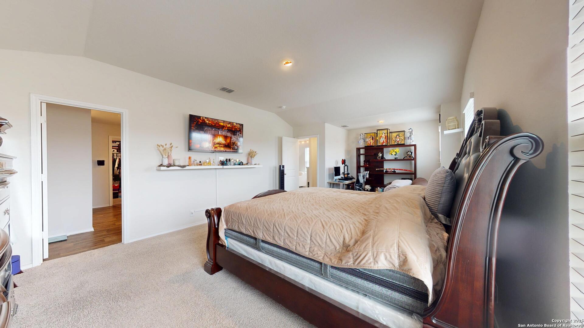 4021 Lilac Path St. Hedwig, TX 78152 - Photo 37 of 49 a bedroom with a bed and dresser