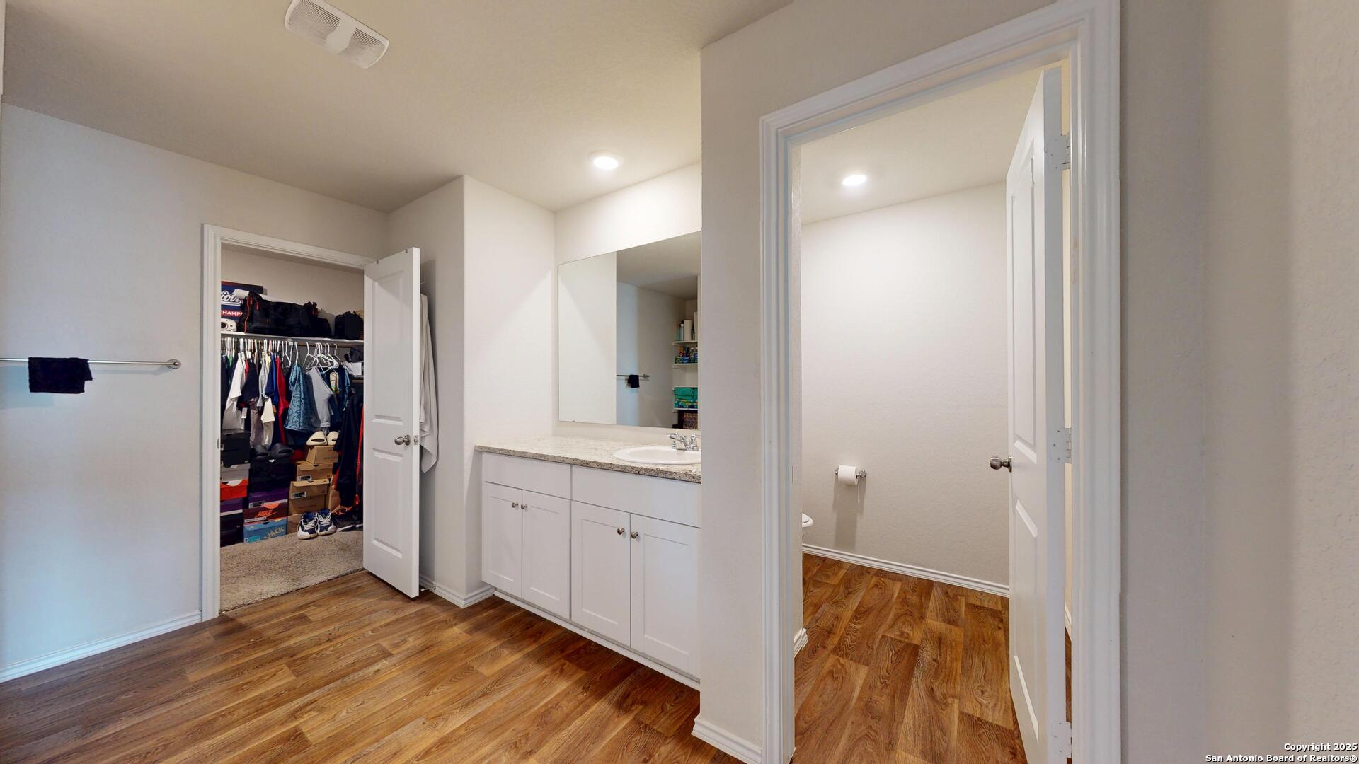 4021 Lilac Path St. Hedwig, TX 78152 - Photo 40 of 49 a view of walk in closet with clothes and shoes