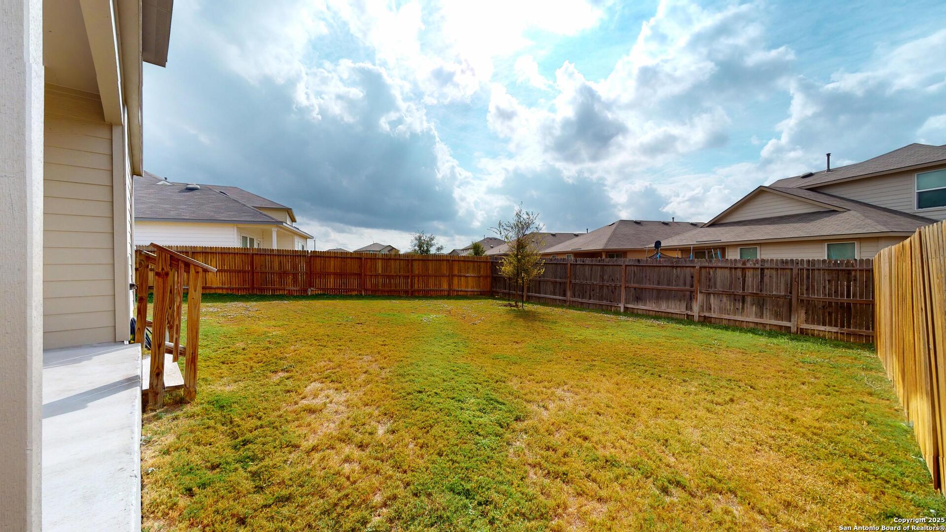 4021 Lilac Path St. Hedwig, TX 78152 - Photo 49 of 49 a view of a swimming pool with an outdoor space and seating area
