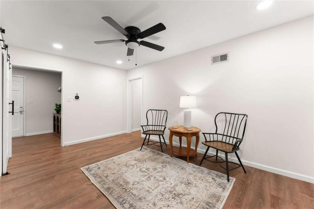 114 Duke Street Jefferson, GA 30549 - Photo 11 of 46 a view of a livingroom with furniture and wooden floor