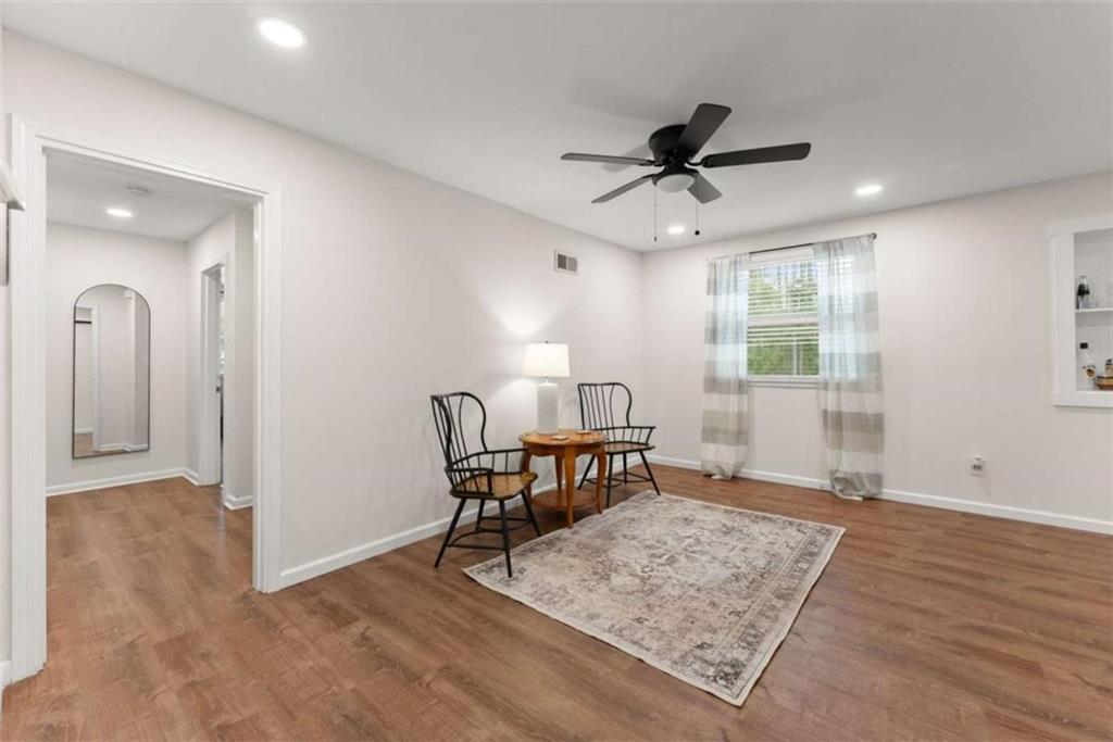 114 Duke Street Jefferson, GA 30549 - Photo 13 of 46 a view of a livingroom with furniture and a ceiling fan