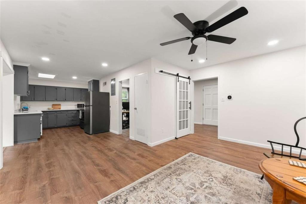114 Duke Street Jefferson, GA 30549 - Photo 15 of 46 a view of a kitchen with a sink and stainless steel appliances