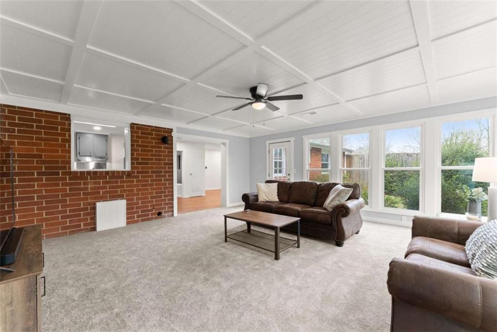 114 Duke Street Jefferson, GA 30549 - Photo 21 of 46 a living room with furniture and a window