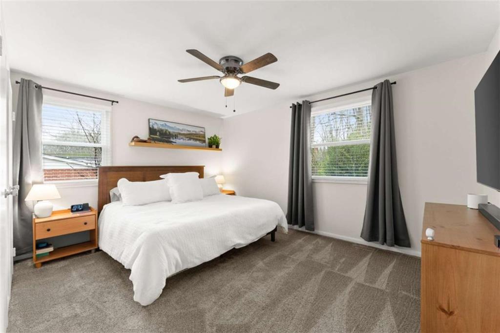 114 Duke Street Jefferson, GA 30549 - Photo 28 of 46 a bedroom with a bed and a window