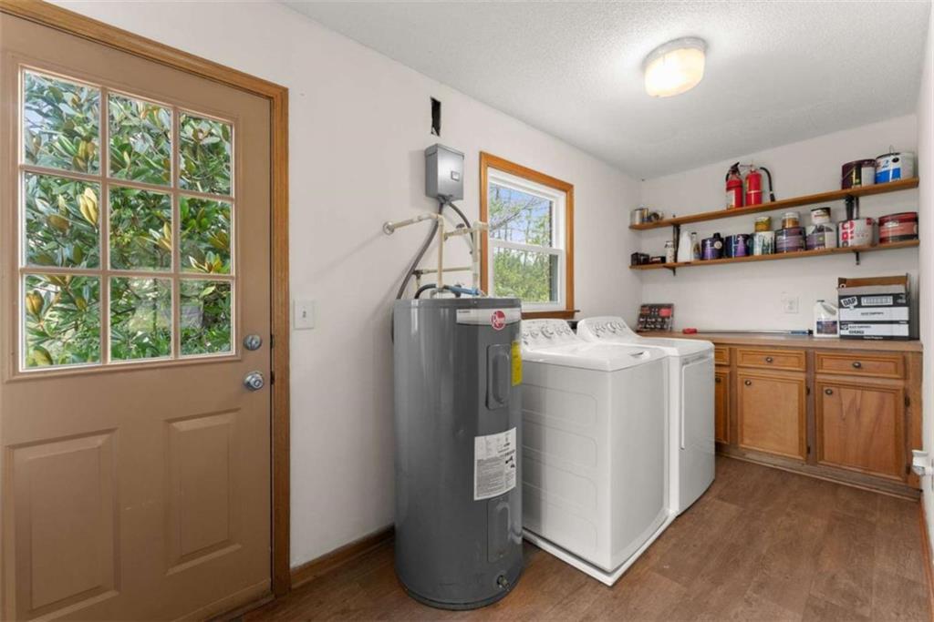 114 Duke Street Jefferson, GA 30549 - Photo 31 of 46 a utility room with a window dryer and washer