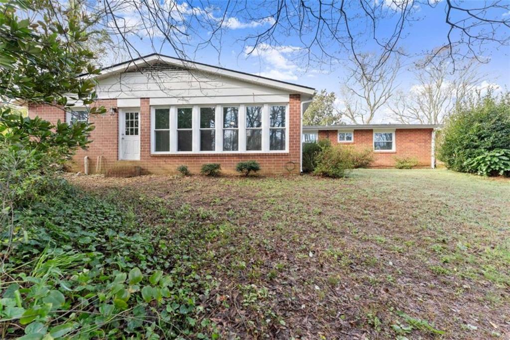 114 Duke Street Jefferson, GA 30549 - Photo 34 of 46 front view of a house with a yard