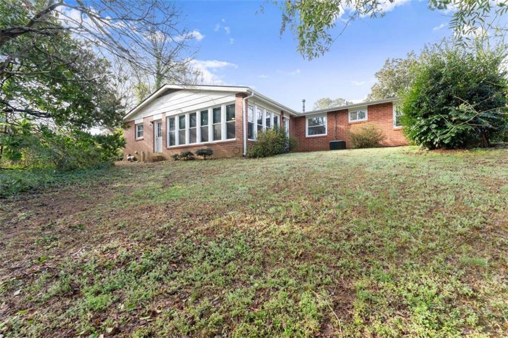 114 Duke Street Jefferson, GA 30549 - Photo 35 of 46 a front view of a house with garden