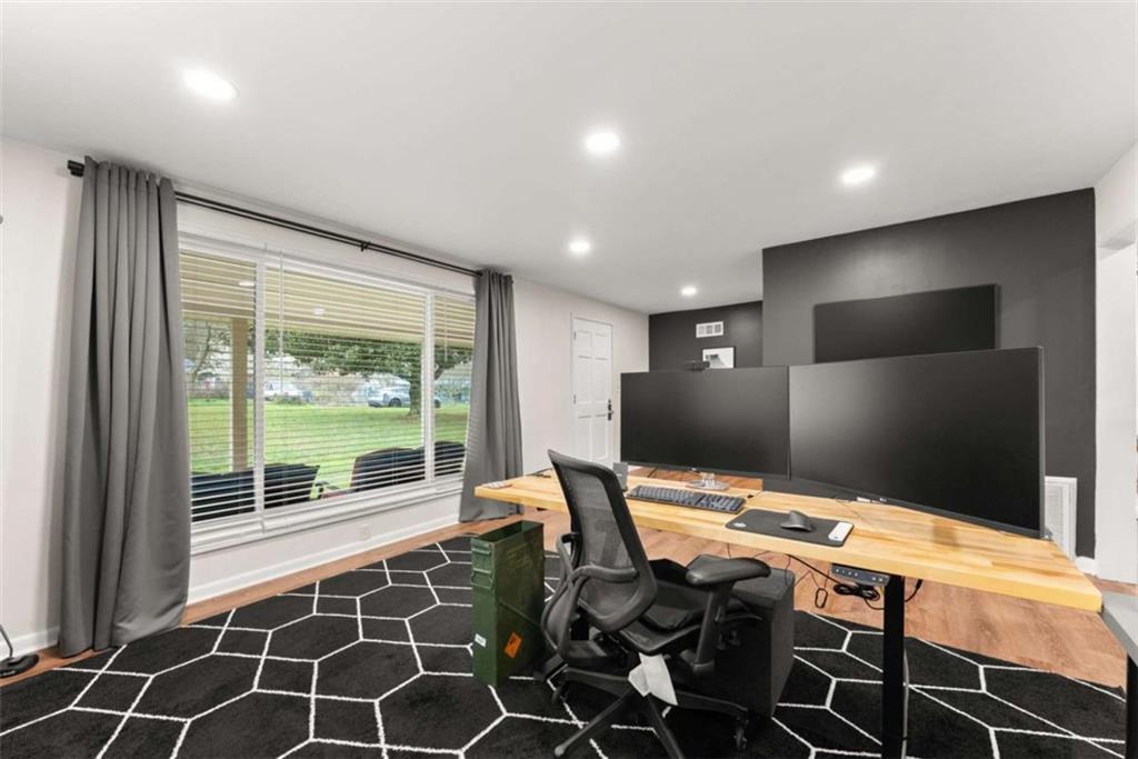 114 Duke Street Jefferson, GA 30549 - Photo 10 of 46 a open kitchen with stainless steel appliances a large island in the center