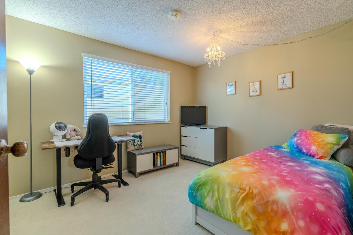 42 Eastridge Circle Pacifica, CA 94044 - Photo 23 of 33 a bedroom with a bed and a desk
