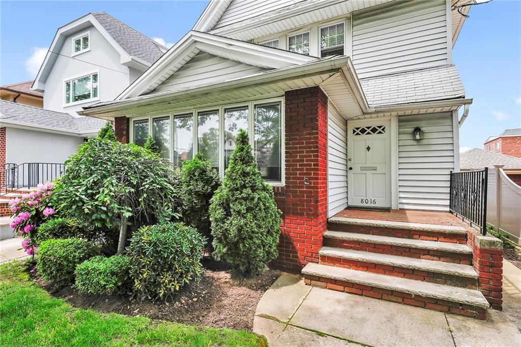 8016 Colonial Road Brooklyn, NY 11209 - Photo 2 of 43 a front view of a house with a garden