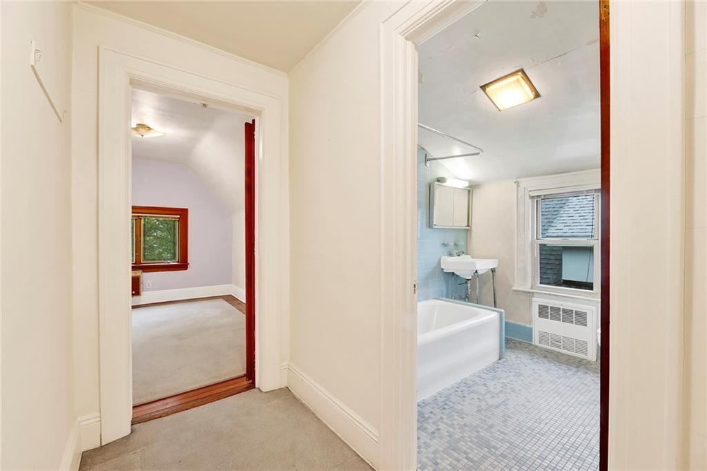 8016 Colonial Road Brooklyn, NY 11209 - Photo 36 of 43 a en suite bathroom with a toilet sink and tub