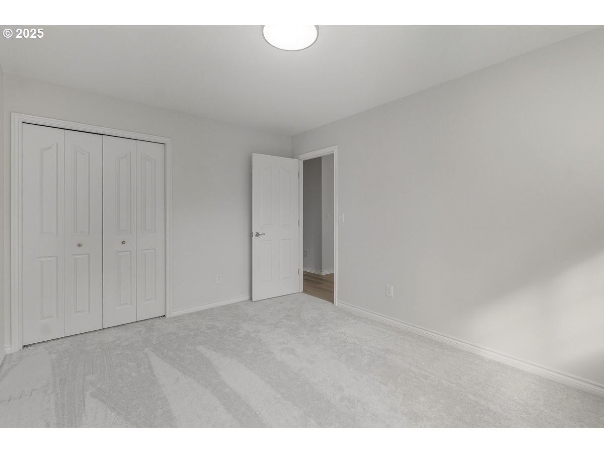 3379 Northwest Banff Drive Portland, OR 97229 - Photo 20 of 26 a view of an empty room