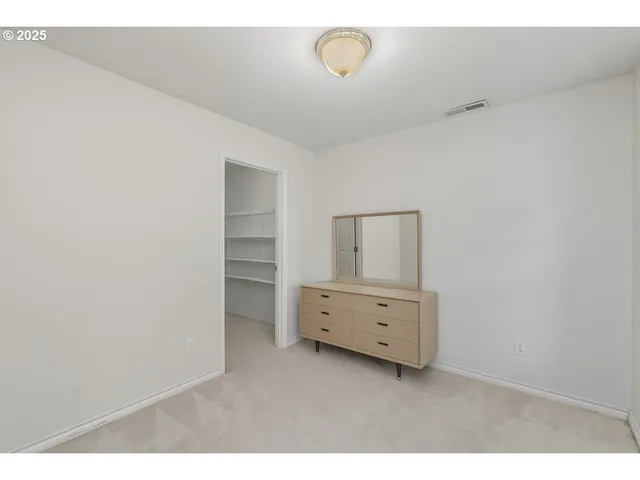 a view of small space with racks on the wall