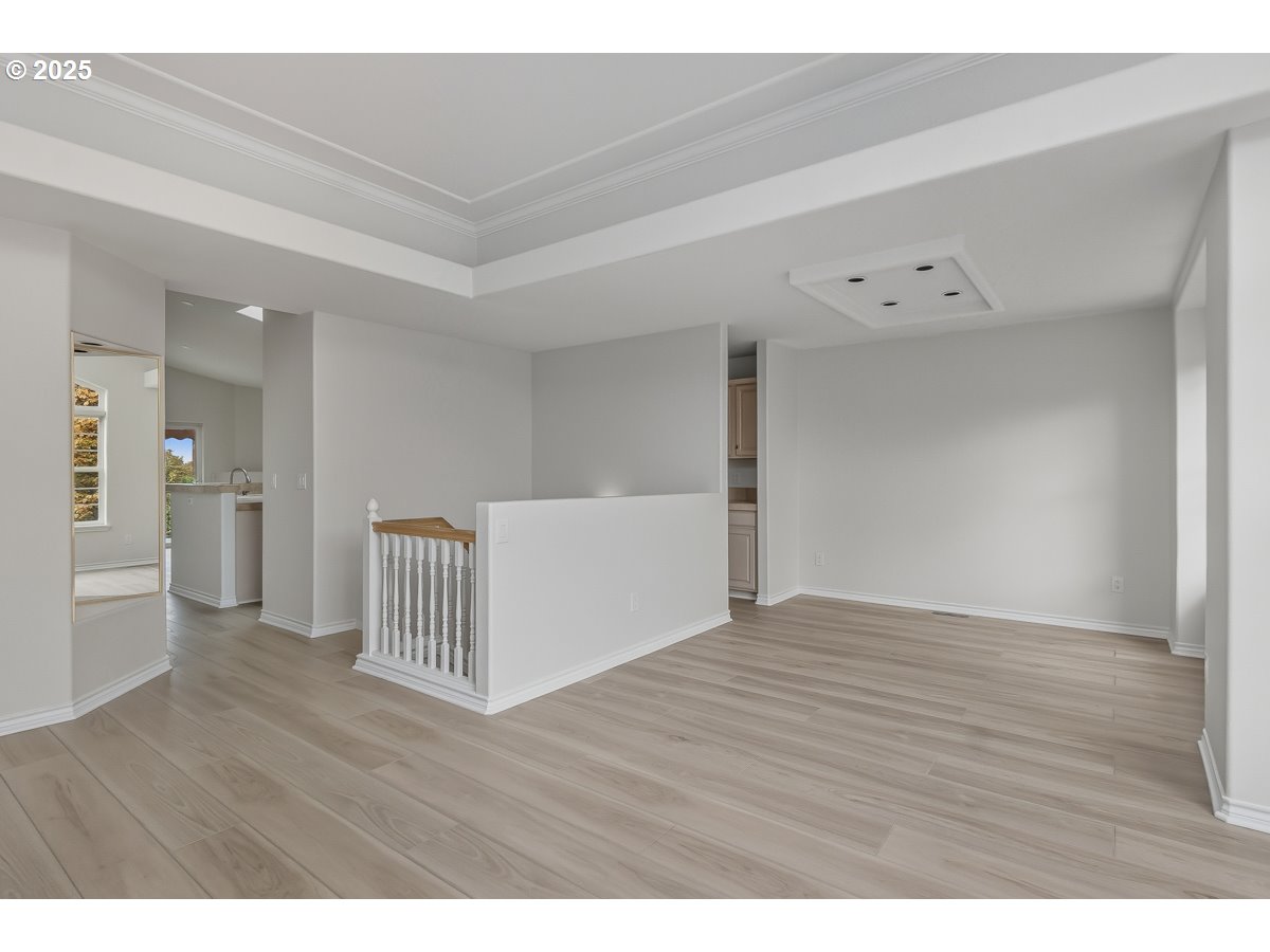 3379 Northwest Banff Drive Portland, OR 97229 - Photo 7 of 26 a view of a livingroom with wooden floor