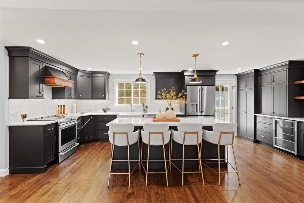 5 Alpine Circle Wakefield, MA 01880 - Photo 13 of 42 a large kitchen with a table and chairs