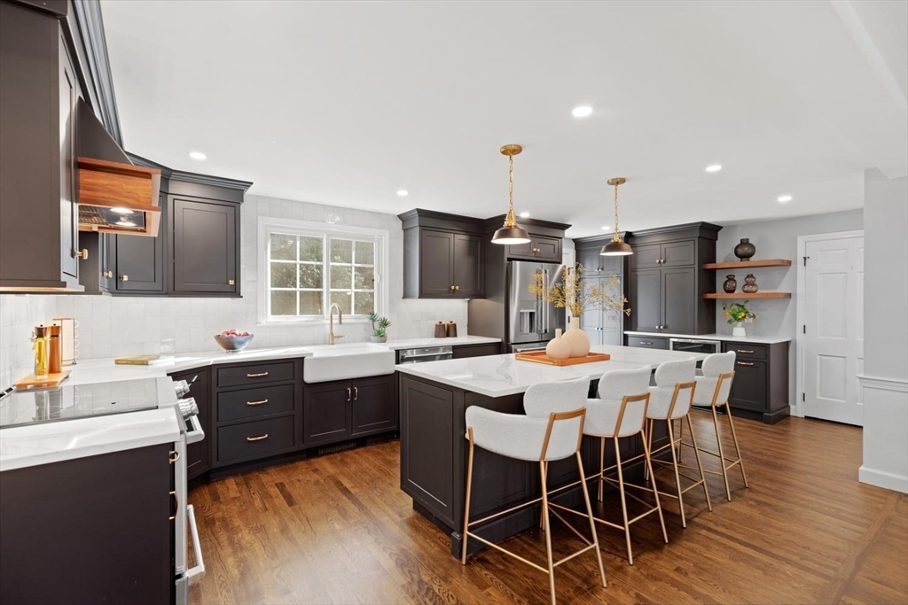 5 Alpine Circle Wakefield, MA 01880 - Photo 14 of 42 a large kitchen with a table and chairs