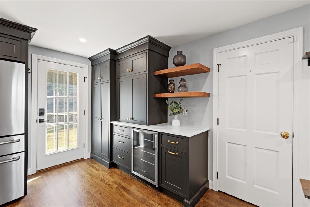 5 Alpine Circle Wakefield, MA 01880 - Photo 20 of 42 a view of kitchen with stainless steel appliances cabinets and wooden floor