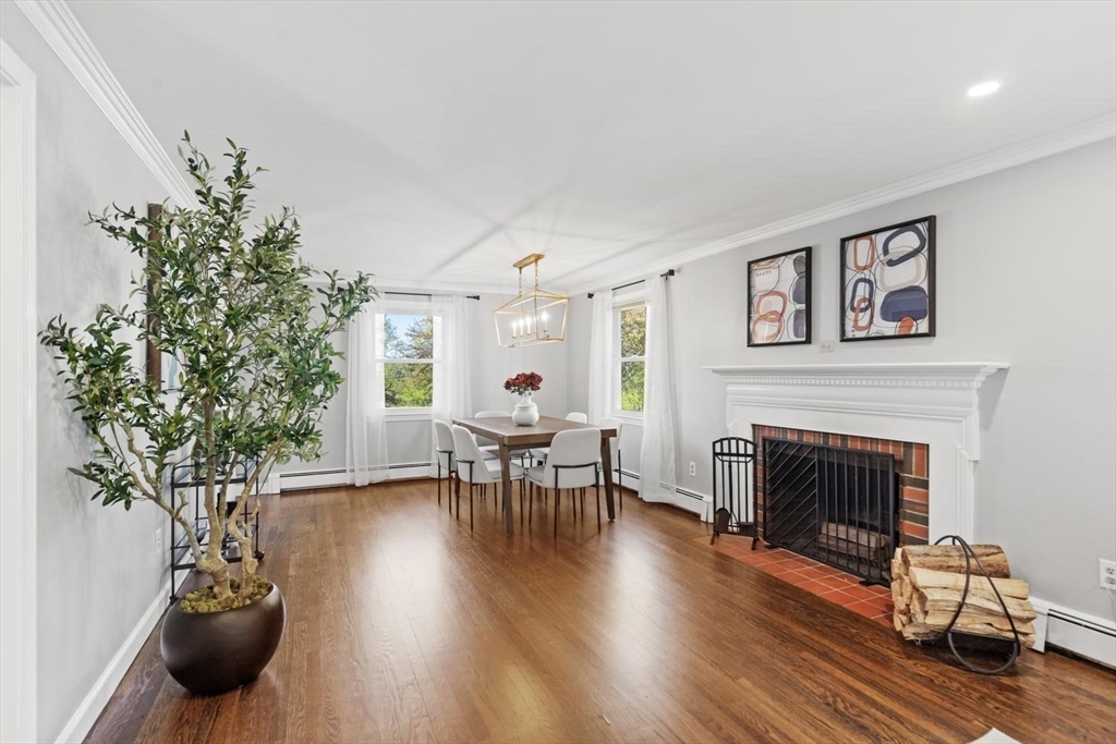 5 Alpine Circle Wakefield, MA 01880 - Photo 22 of 42 a living room with furniture and a fireplace