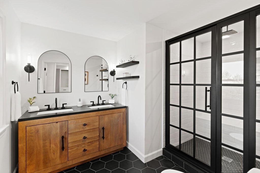 5 Alpine Circle Wakefield, MA 01880 - Photo 33 of 42 a bathroom with a double vanity sink and mirror