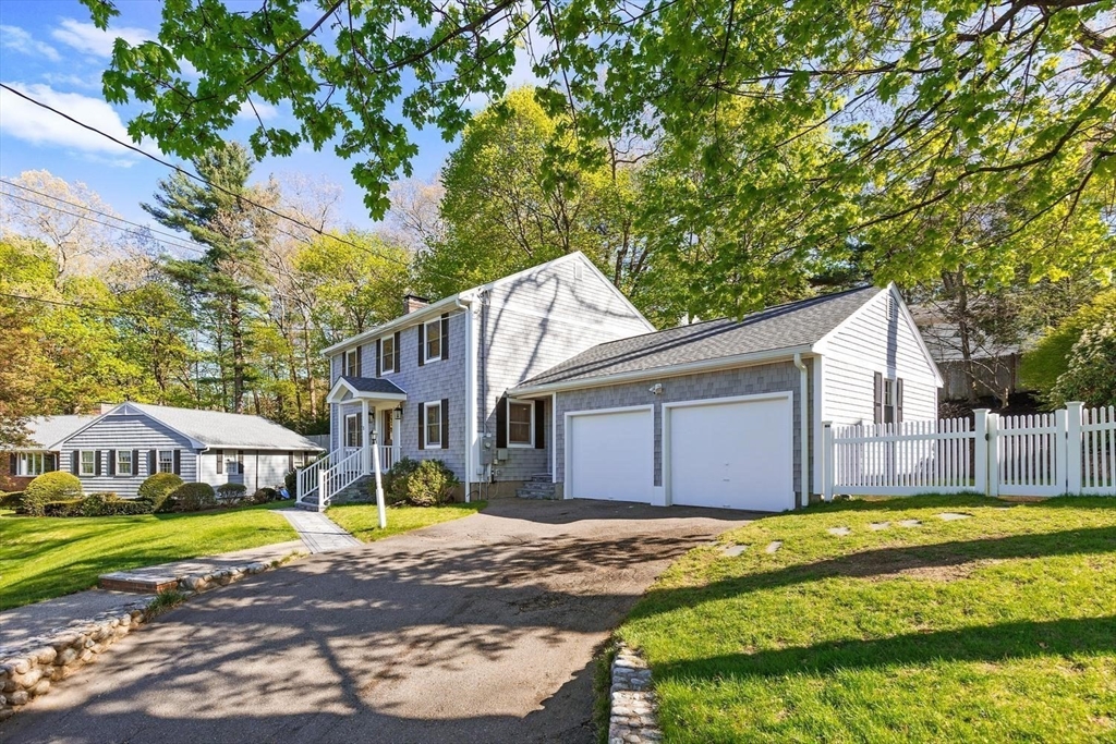 5 Alpine Circle Wakefield, MA 01880 - Photo 7 of 42 a view of a house with a big yard and large tree