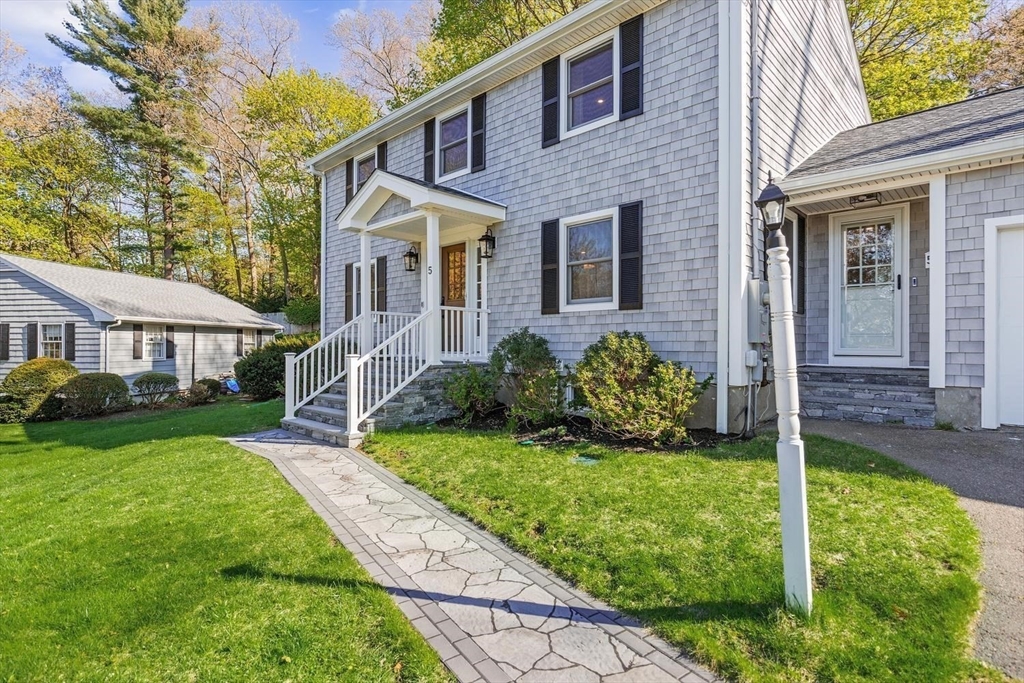 5 Alpine Circle Wakefield, MA 01880 - Photo 8 of 42 a front view of a house with a yard