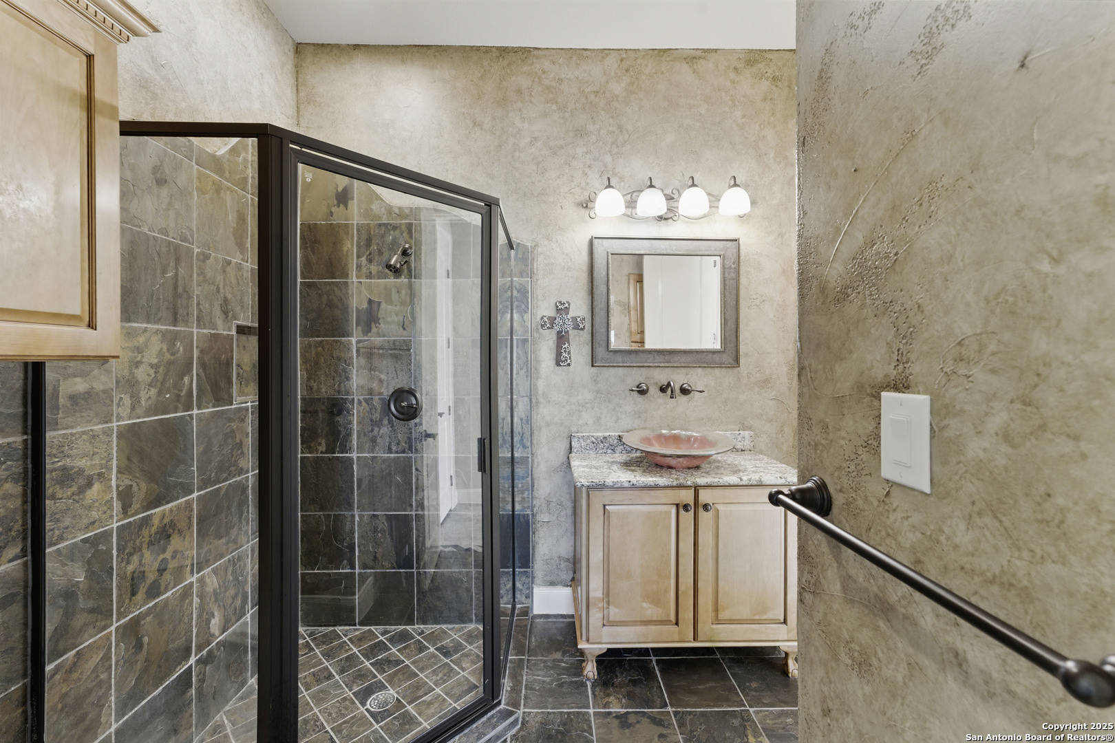 211 Macaw Lane Spring Branch, TX 78070 - Photo 12 of 85 a bathroom with a sink a toilet and shower