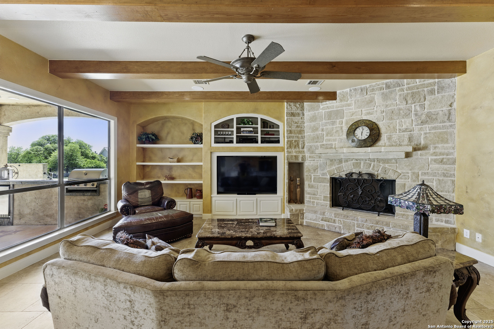211 Macaw Lane Spring Branch, TX 78070 - Photo 18 of 85 a living room with furniture and a fireplace