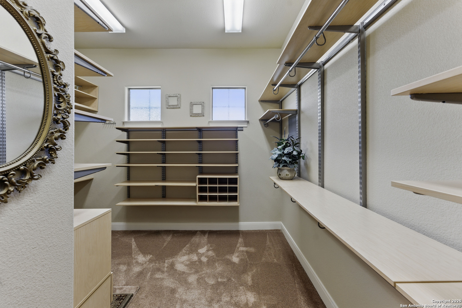 211 Macaw Lane Spring Branch, TX 78070 - Photo 26 of 85 a view of walk in closet with empty racks