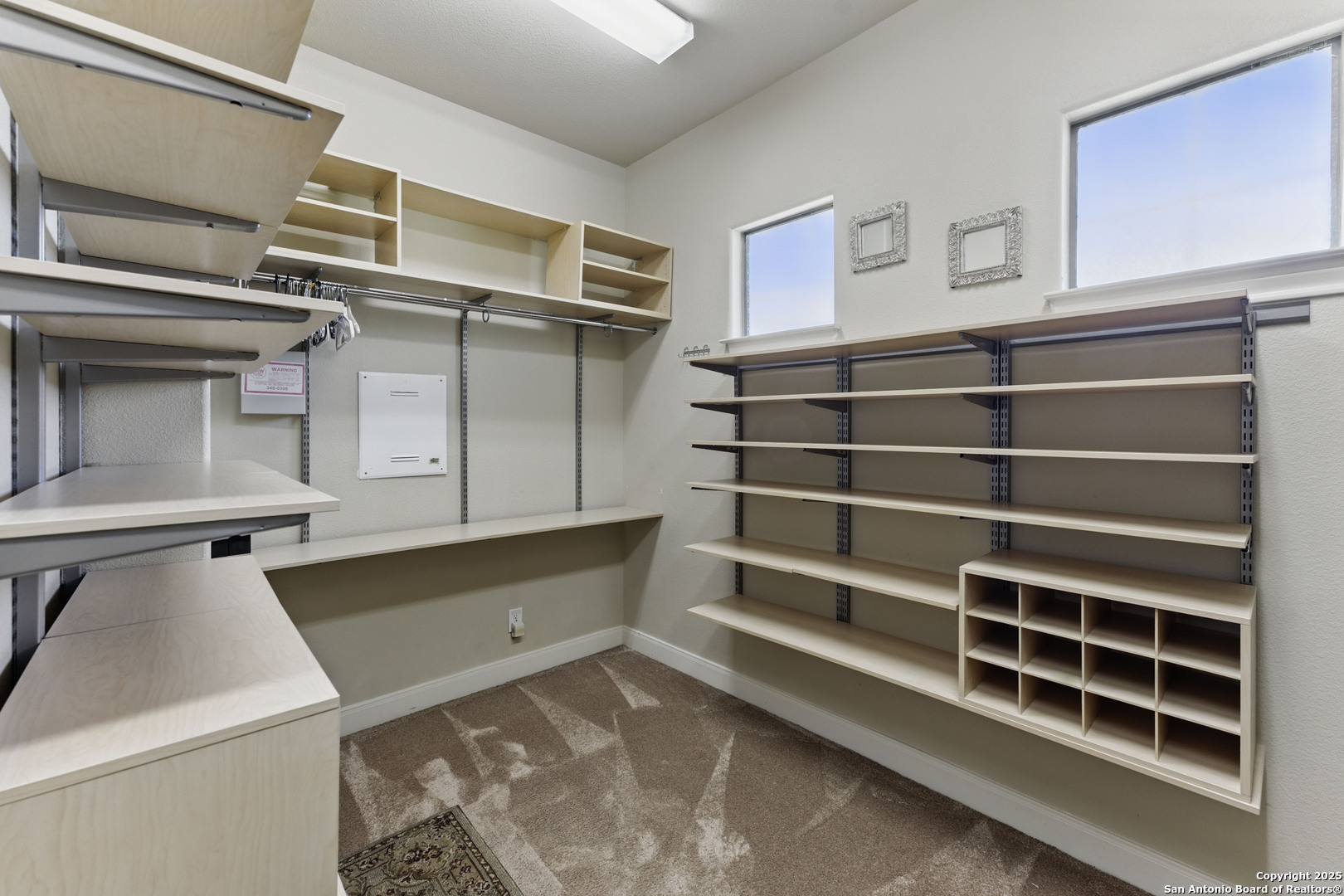 211 Macaw Lane Spring Branch, TX 78070 - Photo 27 of 85 a view of walk in closet with empty racks