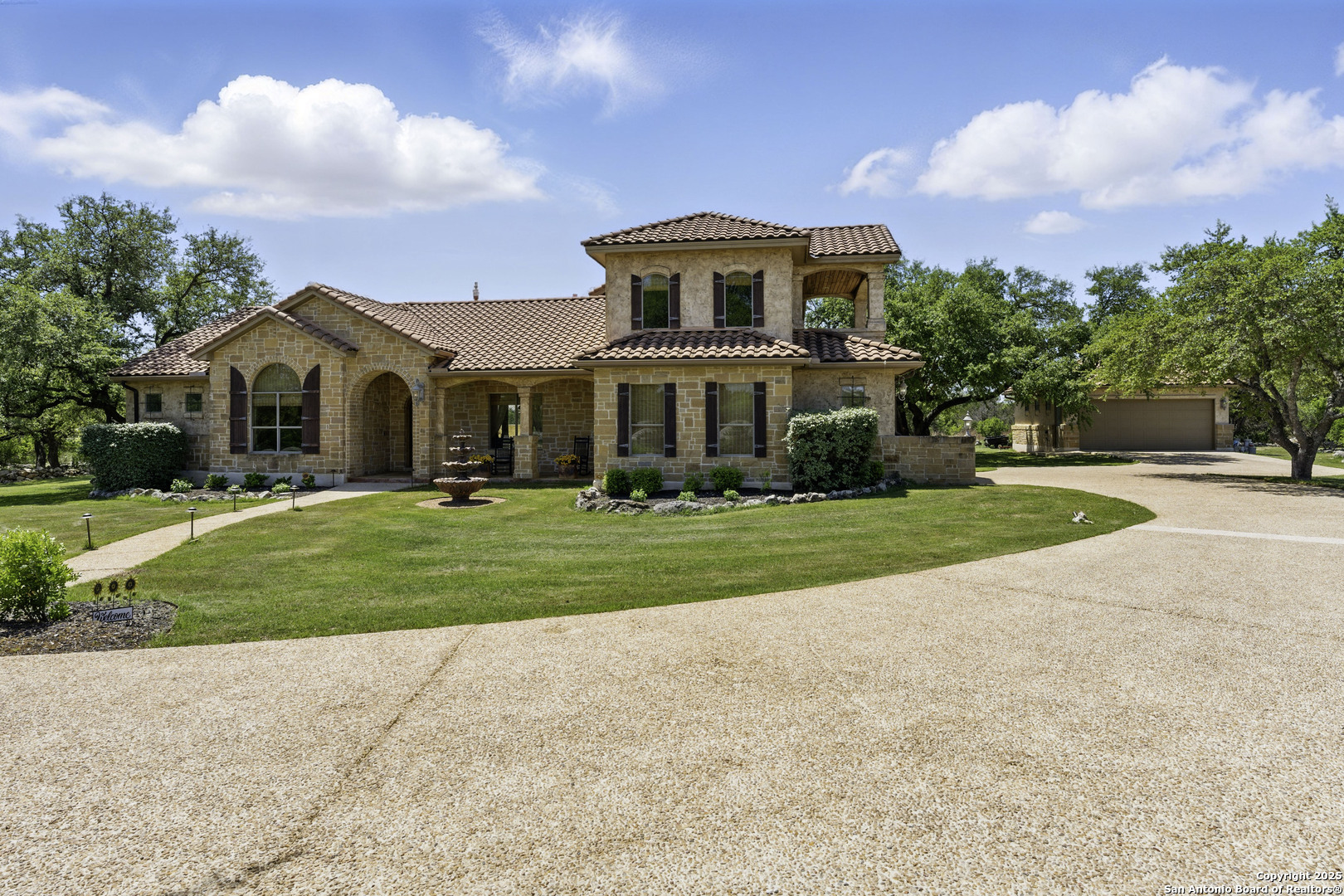 211 Macaw Lane Spring Branch, TX 78070 - Photo 3 of 85 a front view of house with yard and green space