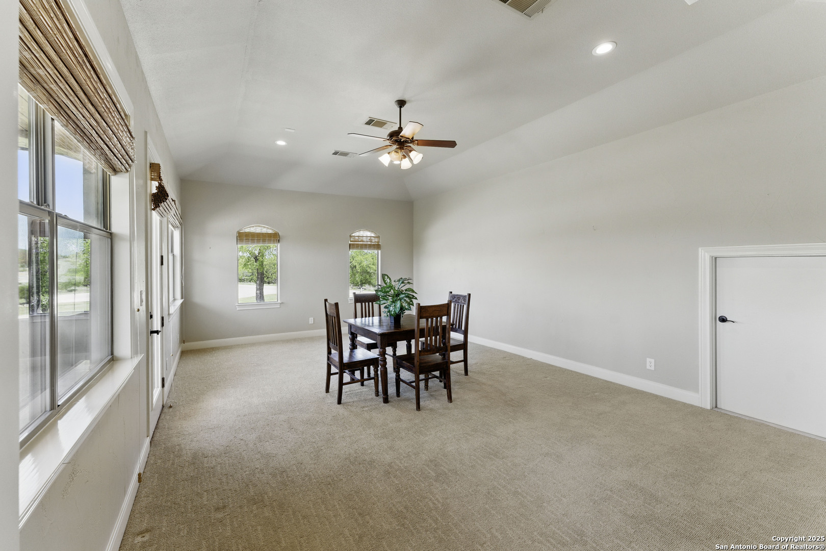 211 Macaw Lane Spring Branch, TX 78070 - Photo 31 of 85 a dining room with furniture and chandelier fan