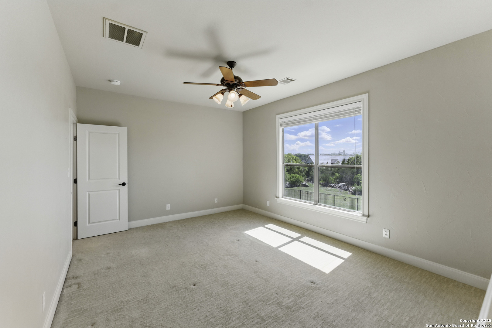 211 Macaw Lane Spring Branch, TX 78070 - Photo 35 of 85 a view of an empty room with a window