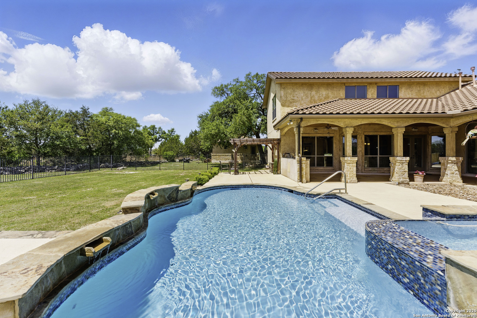 211 Macaw Lane Spring Branch, TX 78070 - Photo 46 of 85 a view of a house with swimming pool and a yard
