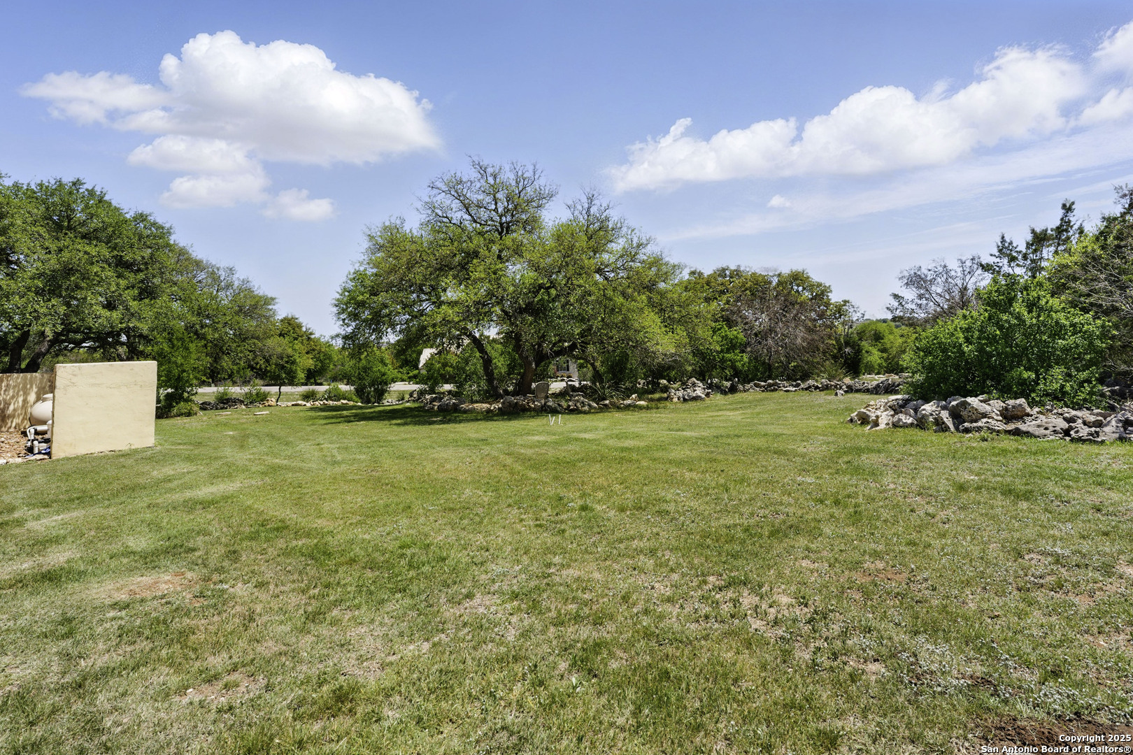 211 Macaw Lane Spring Branch, TX 78070 - Photo 52 of 85 a view of outdoor space with deck and yard