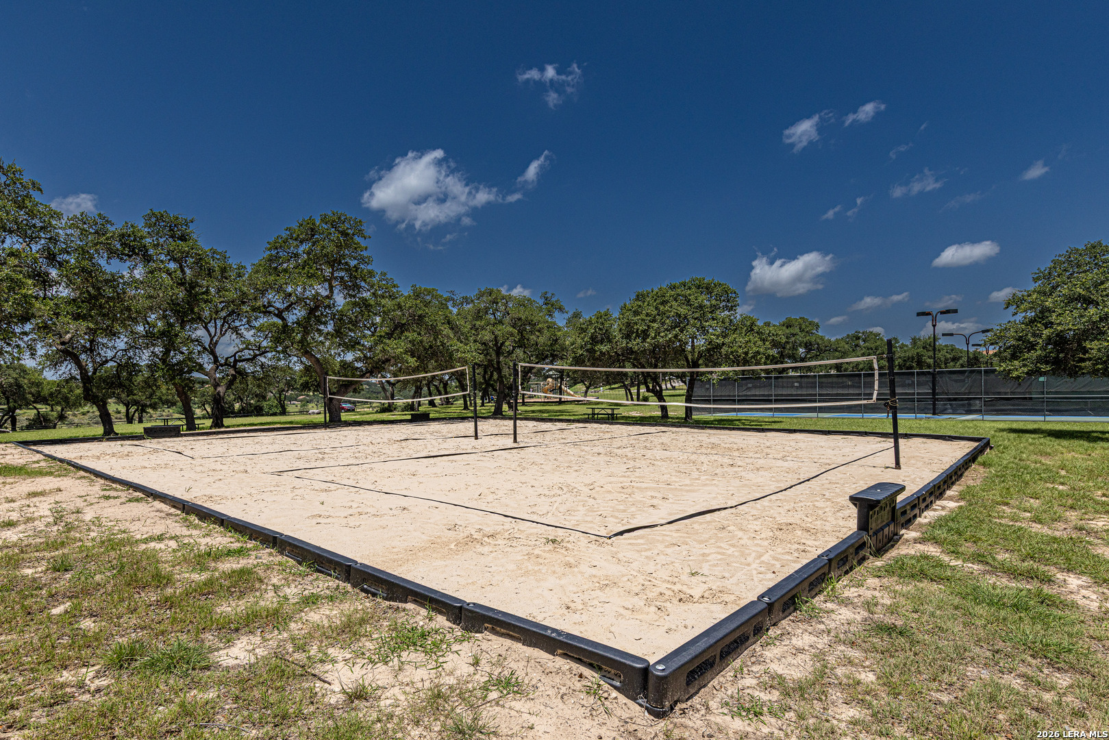 211 Macaw Lane Spring Branch, TX 78070 - Photo 79 of 85 a view of a swimming pool with a yard