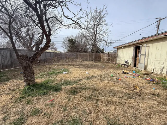 a view of entryway with white walls and window