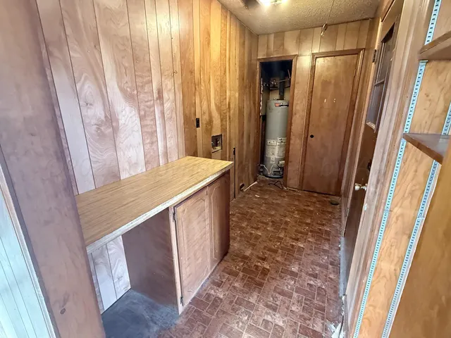 a bathroom with a sink and a shower