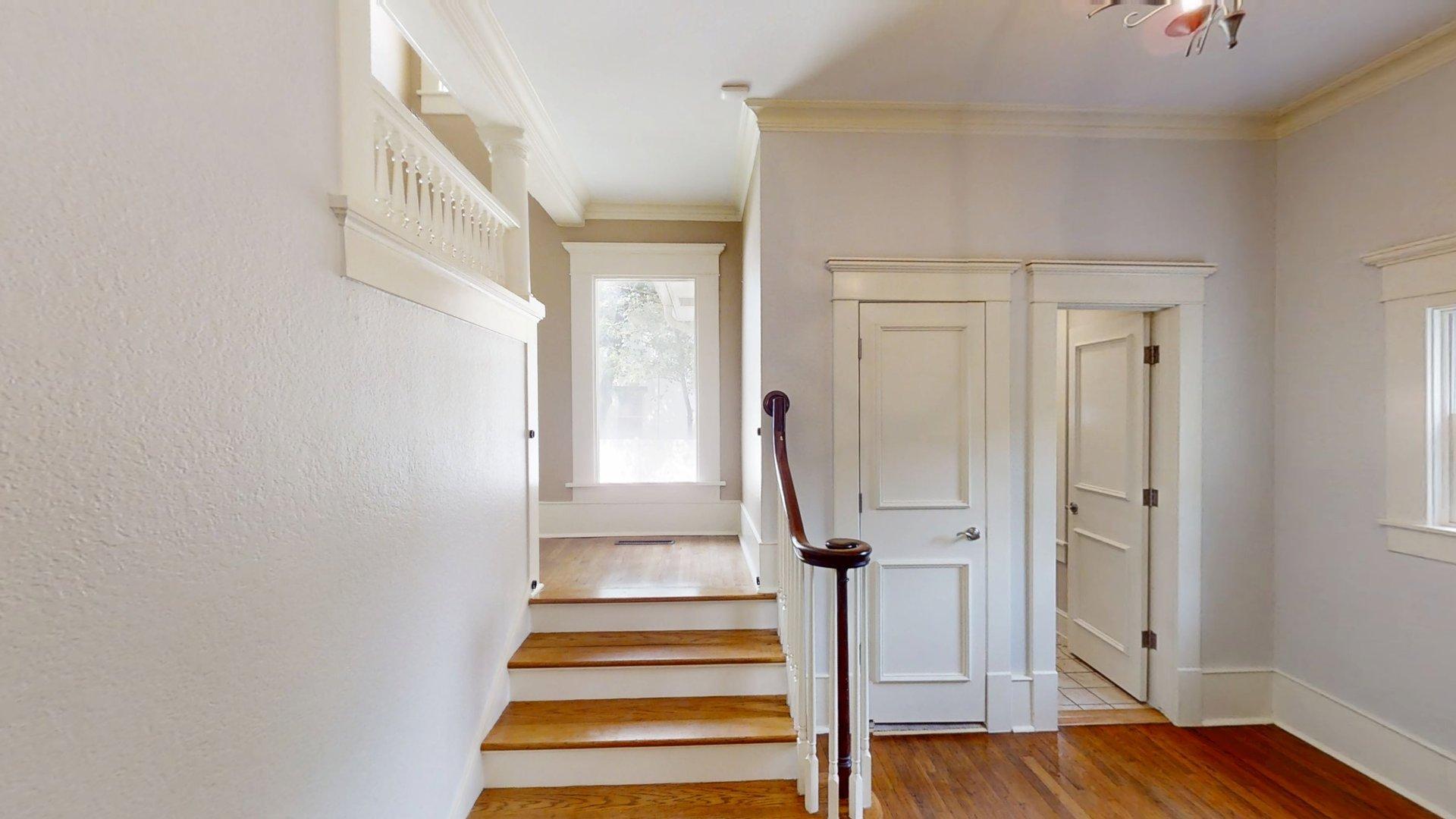 219 F Street Southwest Ardmore, OK 73401 - Photo 19 of 58 Hardwood flooring, paneled interior doors, and crown molding
