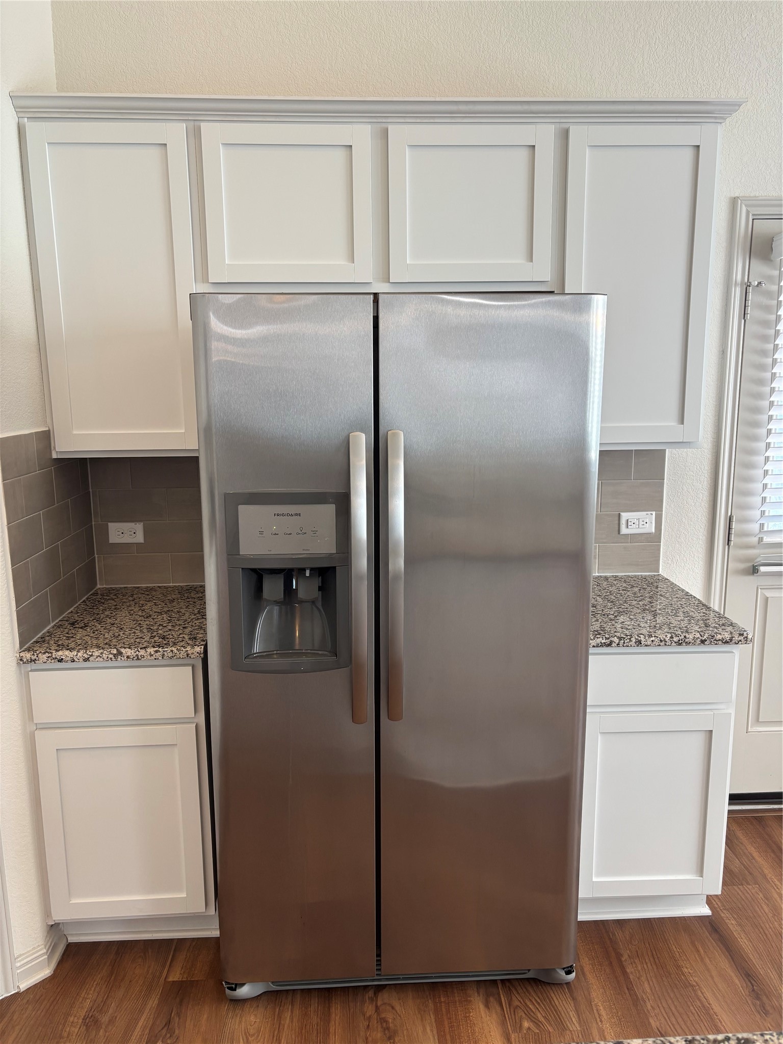 18401 Calasetta Drive Pflugerville, TX 78660 - Photo 15 of 35 Great stainless fridge, and cabinet space.