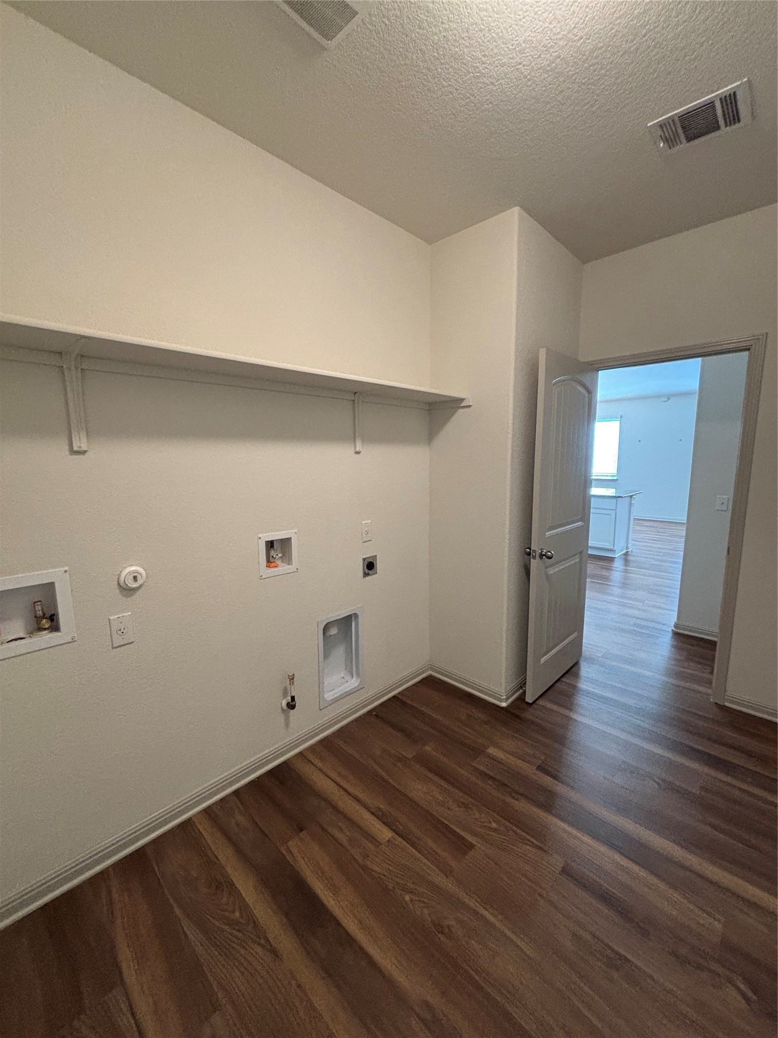 18401 Calasetta Drive Pflugerville, TX 78660 - Photo 21 of 35 Sizable laundry room. Possible space for extra appliance